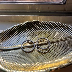 ring bundle. four silver rings, all size small.